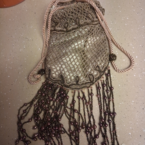 sharmark las vegas Handbags - Chic Beaded Wristlet with Fringe